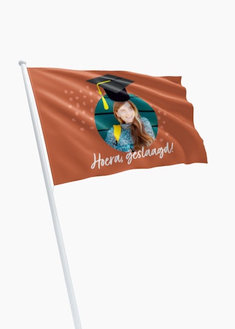 Geslaagd vlag met eigen ontwerp